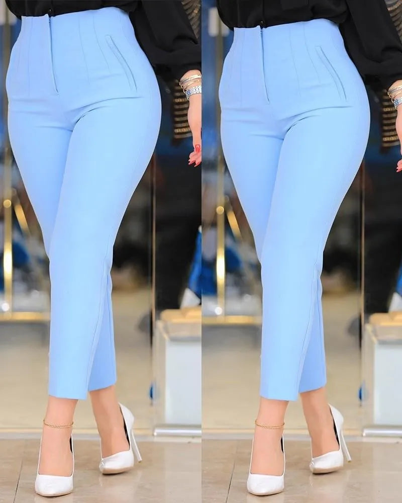 Calça alfaiataria feminina cintura alta, modelagem slim ou reta, tecido sofisticado com elastano. Perfeita para trabalho e ocasiões elegantes.