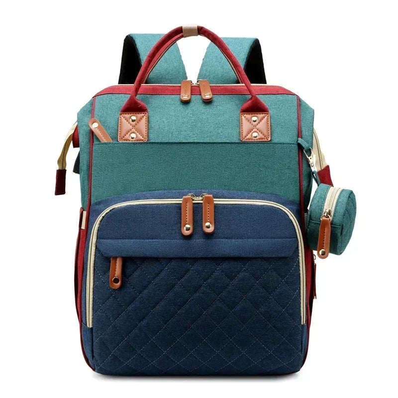 Mochila maternidade 3 em 1 com berço portátil, trocador embutido e compartimentos espaçosos para pais modernos