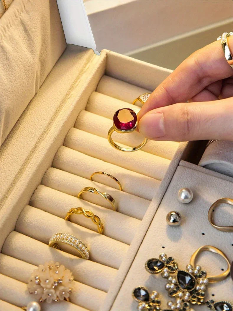 Organizador de joias portátil e elegante com espelho, ideal para viagens e proteção de anéis, brincos, colares e pulseiras