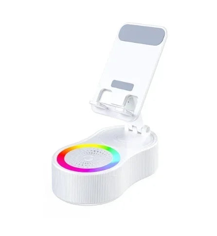 Suporte de celular com alto-falante Bluetooth integrado, rotação 360° e luz LED ambiente. Perfeito para vídeos, chamadas e iluminação decorativa.