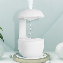 Umidificador com efeito antigravidade e névoa fria. Design moderno, silencioso e ideal para relaxar, dormir ou decorar o ambiente com estilo.