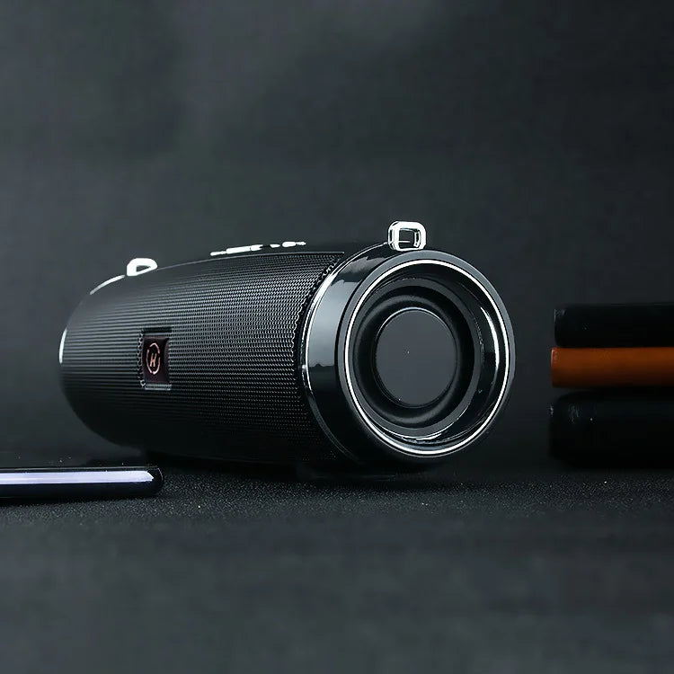 Caixa de som portátil Bluetooth potente com bateria recarregável.