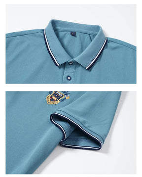 Camisa polo masculina com lapela elegante, bordado frontal premium e gola com botões. Confortável, estilosa e disponível do PP ao XGG.