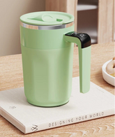 Caneca inteligente com base de aquecimento magnético e carregamento por indução. Mantém bebidas quentes e carrega celular. Design moderno e funcional.