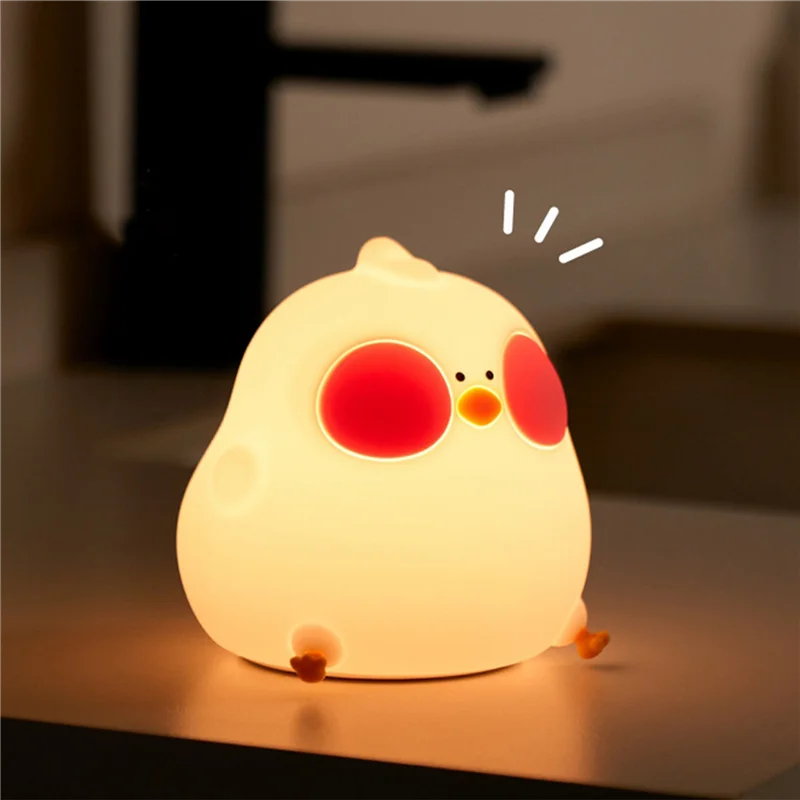 Luminária LED Galinha em silicone branco, luz quente, toque interativo, perfeita para quartos infantis, segura e divertida.