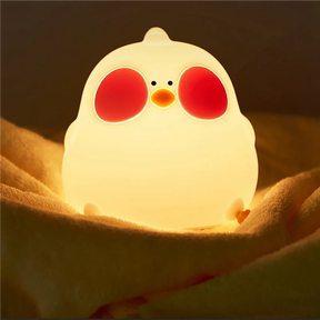 Luminária LED Galinha em silicone branco, luz quente, toque interativo, perfeita para quartos infantis, segura e divertida.