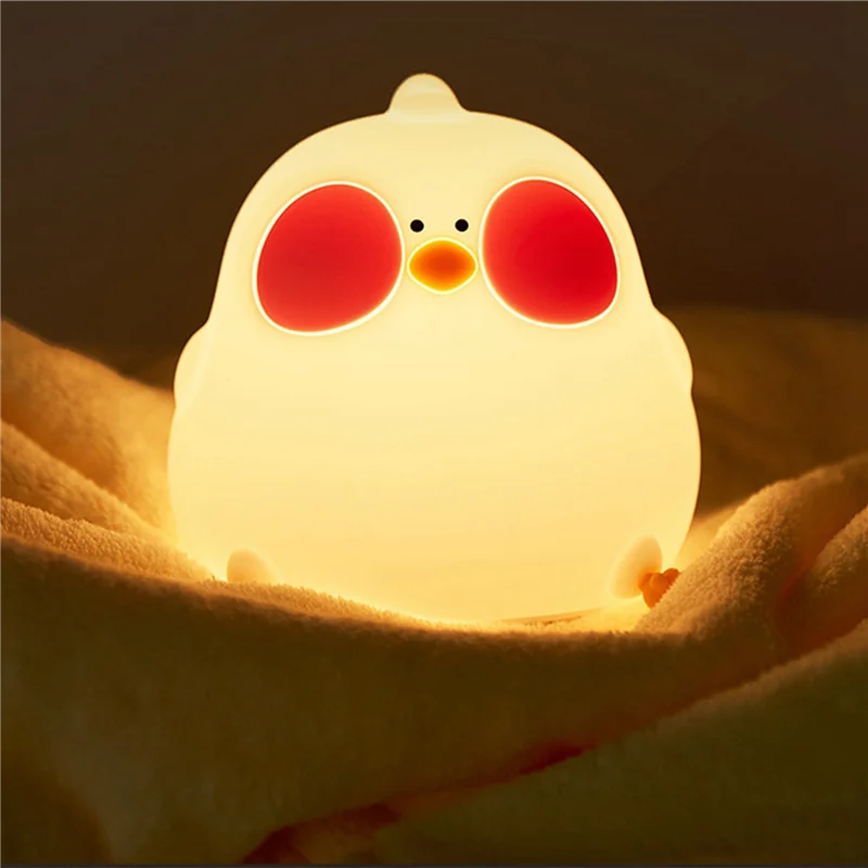 Luminária LED Galinha em silicone branco, luz quente, toque interativo, perfeita para quartos infantis, segura e divertida.
