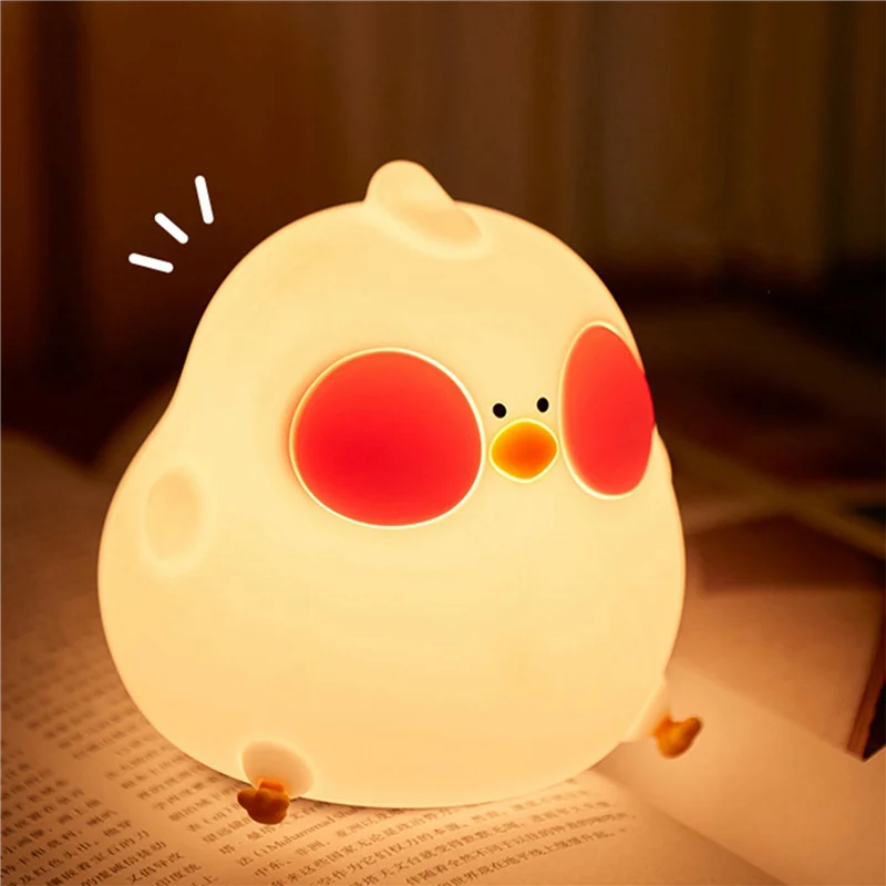 Luminária LED Galinha em silicone branco, luz quente, toque interativo, perfeita para quartos infantis, segura e divertida.