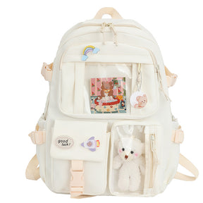 Mochila infantil feminina com estampa colorida, material leve em poliéster, alças acolchoadas confortáveis, bolsos amplos e design alegre, ideal para uso escolar.