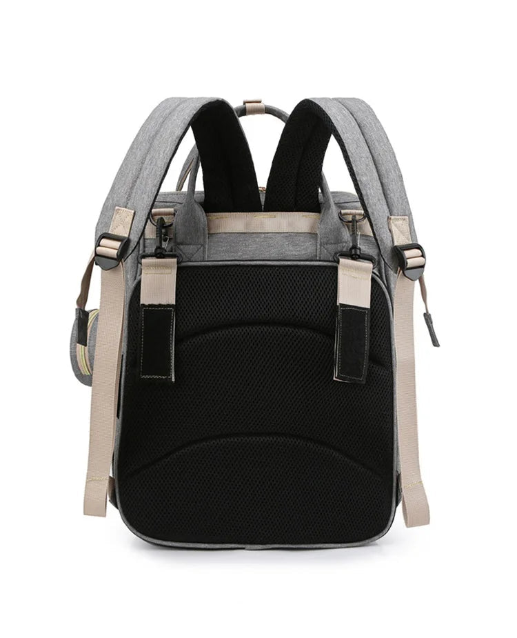 Mochila maternidade 3 em 1 que vira berço portátil prática e funcional.