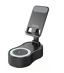 Suporte de celular com alto-falante Bluetooth integrado, rotação 360° e luz LED ambiente. Perfeito para vídeos, chamadas e iluminação decorativa.