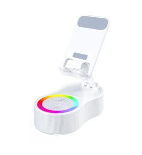 Suporte de celular com alto-falante Bluetooth integrado, rotação 360° e luz LED ambiente. Perfeito para vídeos, chamadas e iluminação decorativa.