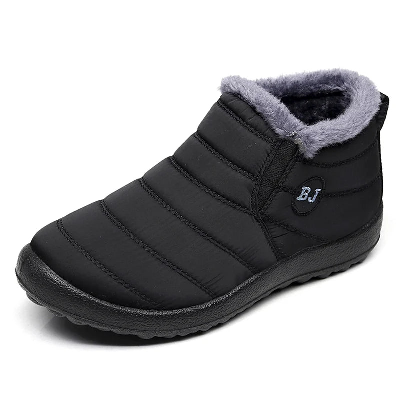 Bota feminina térmica com forro interno, solado antiderrapante e exterior impermeável. Ideal para dias frios, neve e looks de inverno com estilo.