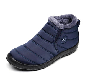 Bota feminina térmica com forro interno, solado antiderrapante e exterior impermeável. Ideal para dias frios, neve e looks de inverno com estilo.