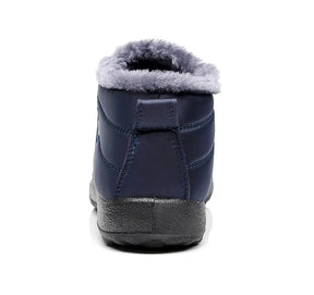 Bota feminina térmica com forro interno, solado antiderrapante e exterior impermeável. Ideal para dias frios, neve e looks de inverno com estilo.