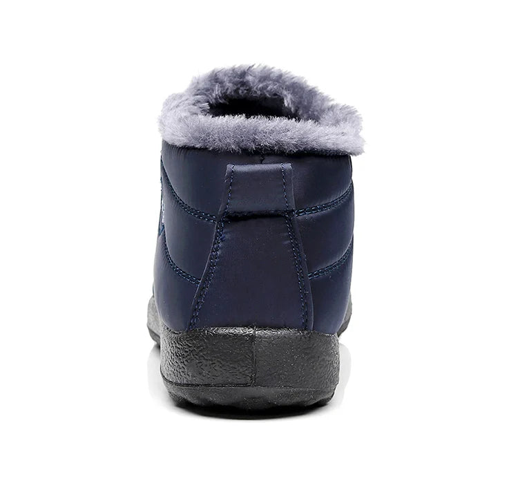 Bota feminina térmica com forro interno, solado antiderrapante e exterior impermeável. Ideal para dias frios, neve e looks de inverno com estilo.